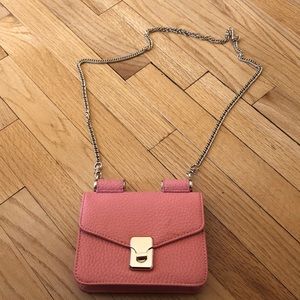 Orange/ coral cross body bag